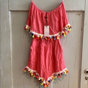 Fun Romper with Pom Pom & Tassel Details!